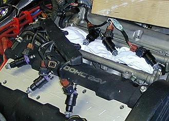 Fuel injectors in harness